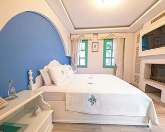 Sigacik Gardenya Boutique Hotel - Seferihisar - Slaapkamer