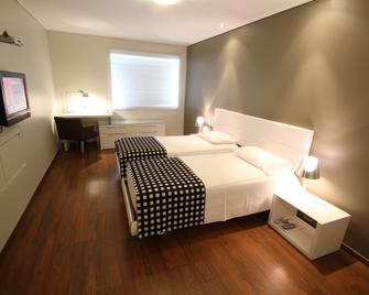 Regency Golf - Hotel Urbano - Montevideo - Bedroom