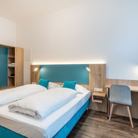 Bedroom view of Dauntown Rooms - Self Check-In