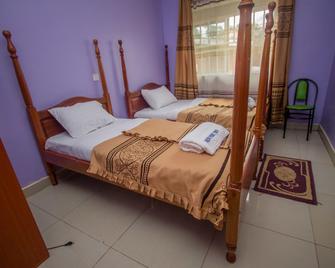 New Fort View Hotel - Nkingo - Bedroom