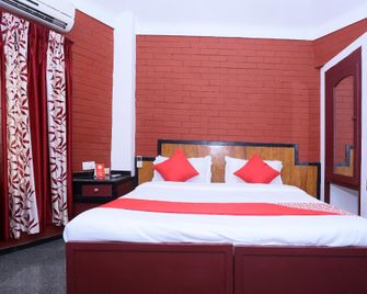 Oyo 23594 T S Holiday Home Resort - Kovalam - Schlafzimmer