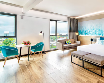 Tanoa Plaza Hotel - Suva - Schlafzimmer