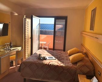 Hotel Antares - גראדו - חדר שינה