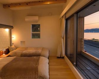 Holly Camp Casa - Amami - Schlafzimmer