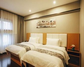 Greentree Alliance Hotel Shanghai Baoshan District - שנחאי - חדר שינה