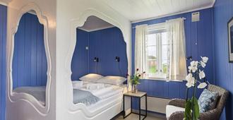 Håholmen Havstuer - by Classic Norway Hotels - Averoy - Bedroom