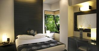 AR Suites Fontana Bay - Pune - Kamar Tidur
