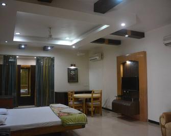 هوتل نافين ريزدنسي - Darbhanga - غرفة نوم