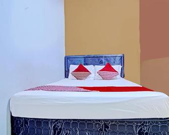 OYO 90476 Iksan Homestay Syariah - Prabumulih - Habitación