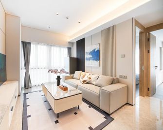 Shenzhen Fuxuan Executive Apartment (Zhongzhou Sungang Subway Station) - Shenzhen - Pokój dzienny