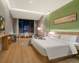 Xingyuan River View Hotel - Tsjoengking - Slaapkamer