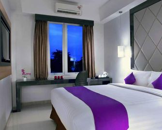 Quest Hotel Balikpapan By Aston - Balikpapan - Slaapkamer