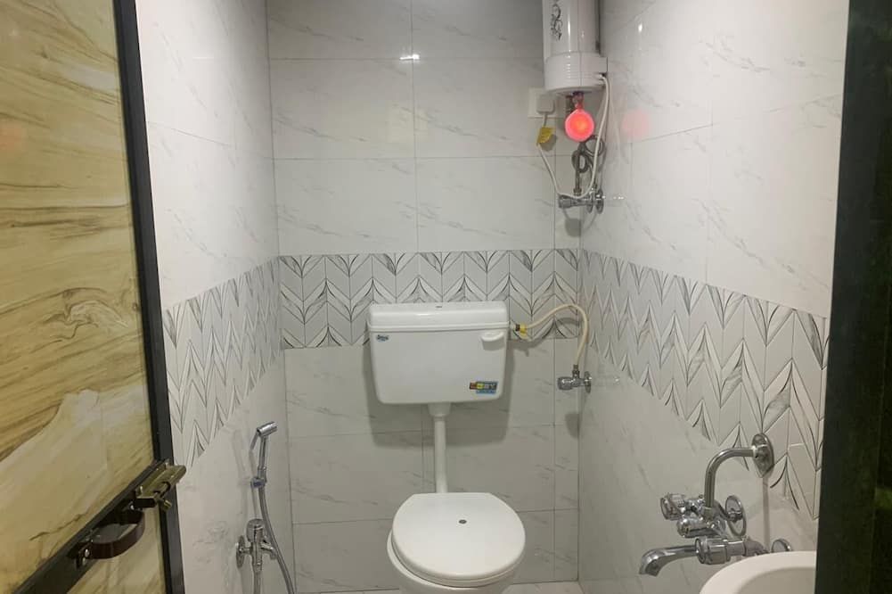Hotel Sai Plaza - מומבאי - חדר רחצה