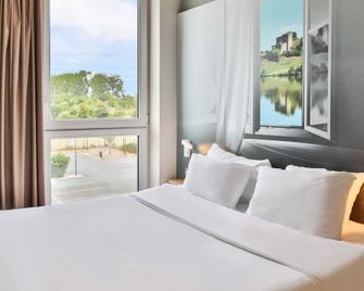 بي آند بي هوتل ليز هيربيير - ليه اربييه - غرفة نوم