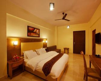 Kamath Residency Adventure Resort - Alibag - Camera da letto