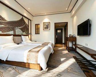 Guandu Hotel - Kunming - Slaapkamer