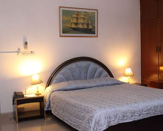 Aristocrat Inn - Dháka - Ložnice