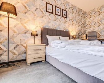 Rentplanet - Apartament Wyszyńskiego - Wrocław - Bedroom