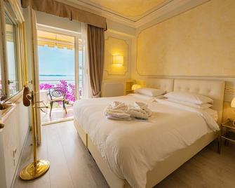 โรงแรมวิลล่า ฟลอริดา - Gardone Riviera - ห้องนอน