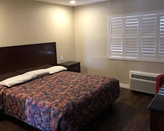 American Inn - Ontario - Bedroom