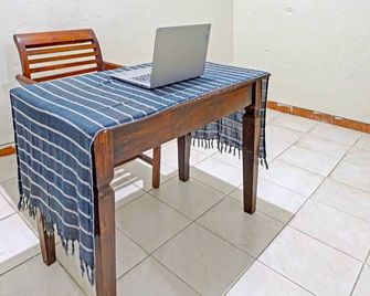 OYO Life 91896 Kost Bu Dewi Syariah - Pasuruan - Recepce