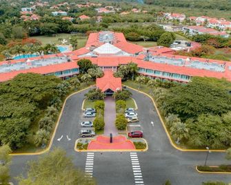 Hodelpa Garden Suites Golf & Convention Center - Guayacanes - Budova