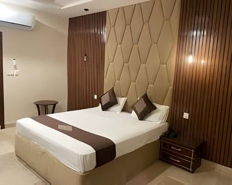 Prime View Hotel - Faisalābād - Bedroom