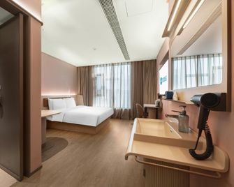 Hanting Hotel Zibo Zhoucun Ancient Commercial City - Zibo - Slaapkamer