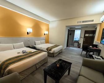 Travel Road Hotel - Hualien City - Bedroom
