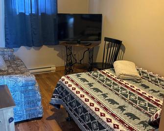 Modern 2 bedroom Cottage on the French River.\n\n - French River - Bedroom