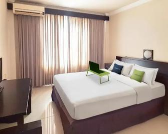 Hotel Surya Kahayan - Palangkaraya - Slaapkamer