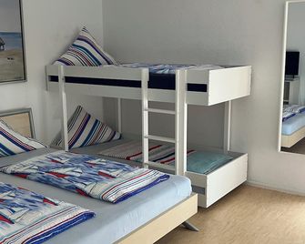 Gästehaus Tante Tienchen - רוסט - חדר שינה