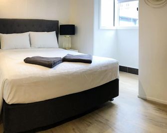 بريسبين كوارترز - بريسبان - غرفة نوم