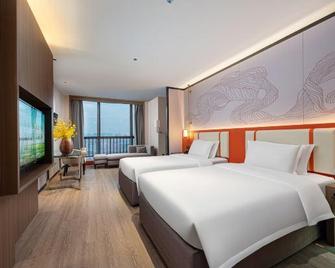Yintian International Business Hotel - Zhuzhou - Schlafzimmer