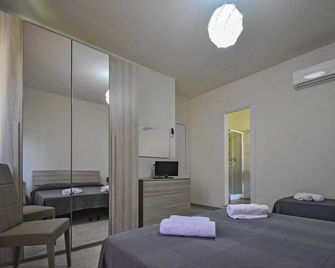 Hotel La Pineta - Marina di Carrara - Slaapkamer