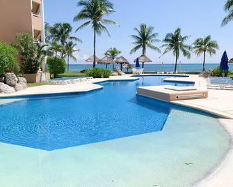 Beach Front Luxury condo - Puerto Aventuras - Piscina