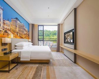 Vienna International Hotel 5.0 Yunfu Century Avenue - Yunfu - Bedroom