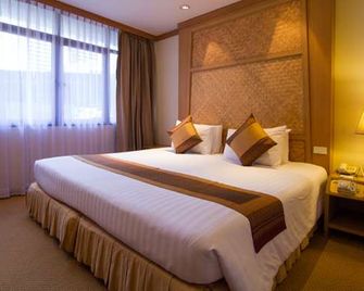 The Tarntawan Hotel Surawong Bangkok - Bangkok - Bedroom