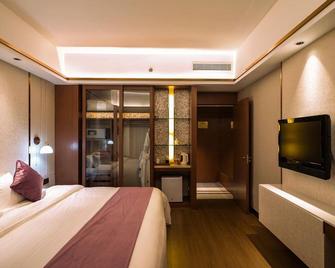 Wenzhou Yaoxi Dynasty Hotel - Wenzhou - Bedroom