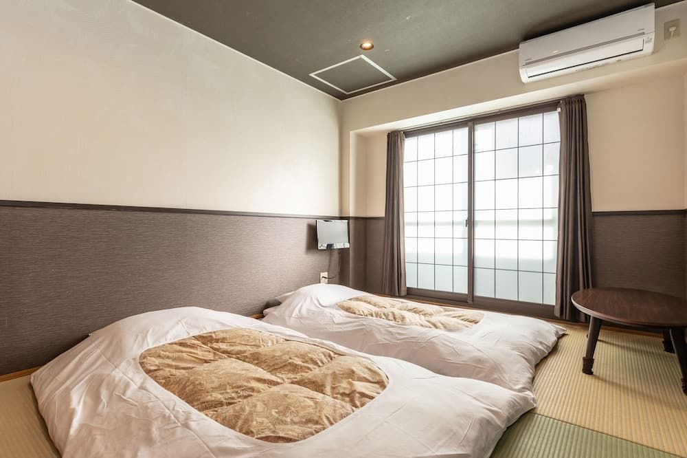 Tabist Sparkling Dolphins Inn Kyoto - קיוטו - חדר שינה