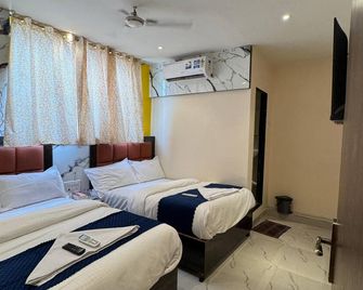 Hotel rishi palace - Mumbai - Bedroom