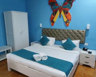 Paradise Village Beach Resort - Calangute - Makuuhuone