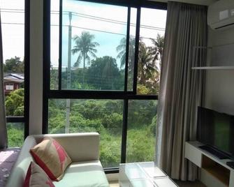 Poud Posto Condo Service - Bangkok - Living room