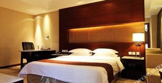 Dongfang Mingyue Business Hotel - Daqing - Bedroom