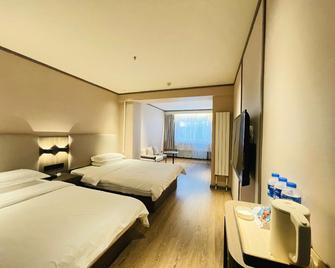 Hanting Hotel Taiyuan Wuyi Road Shandaeryuan - Taiyuan - Slaapkamer