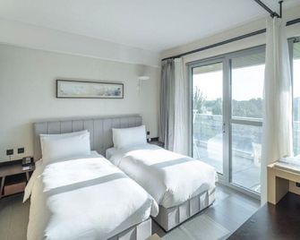 Anlan Hotel - Qinhuangdao - Sypialnia