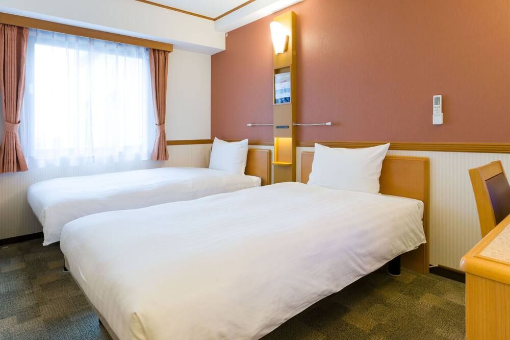 Toyoko Inn Kawasaki Ekimae Shiyakusho-Dori - קאוואסאקי - חדר שינה