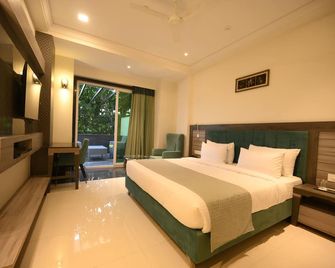 The Mudra Hotel - Varanasi - Schlafzimmer