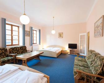 Hotel v Centru - צ'סקה בודיוביצה - חדר שינה