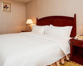 Wuhuan Hotel - Anshan - Bedroom